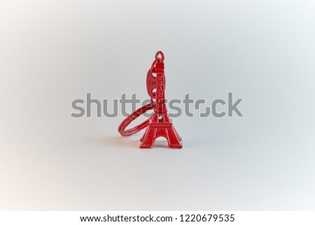                      Red color Eiffel tower souvenir keychain.         