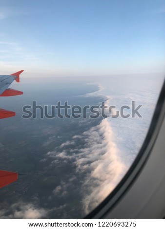 interesting cloud formation from airplane window