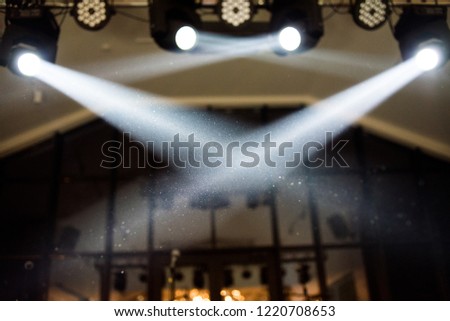 Spotlight rays at a party