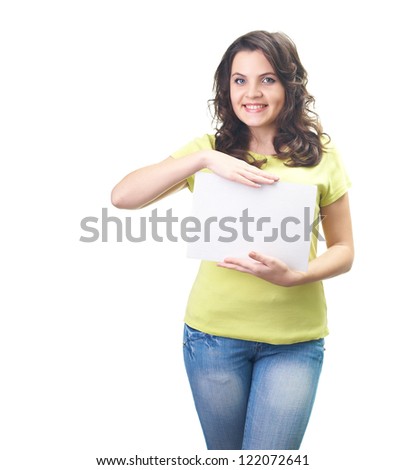 Attractive smiling young woman in a yellow shirt holding a poster. Isolated on white background