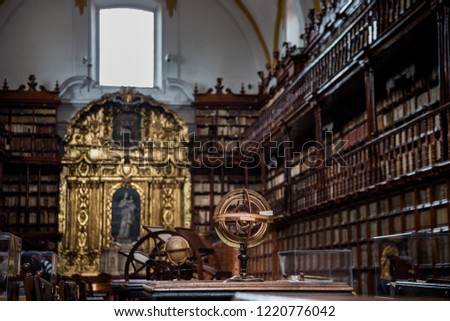 Palafoxiana library of Puebla Mexico, old with wooden furniture and thousands of old books with brown colors, large vaults, clocks and globes, old terraces, shelves and showcases from the 18th century
