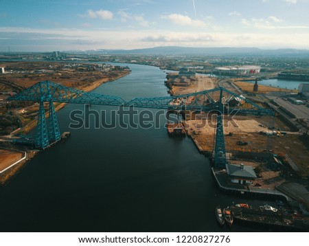 Teesside Middlesbrough transporter Bridge showing the river tees and industrial Middlesbrough Royalty-Free Stock Photo #1220827276