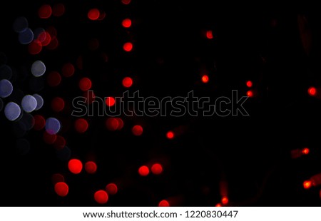 Abstract lights in round sparkle shapes or circles dark background. Christmas background blur bokeh lights, shine texture