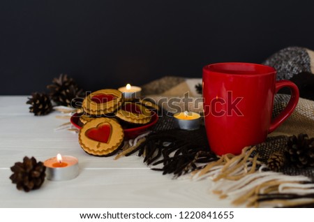 St valentines day still life with candles, coffee and heart shaped cookies