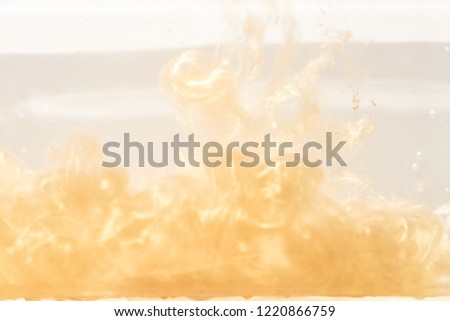 ink in water, golden wave, abstract background