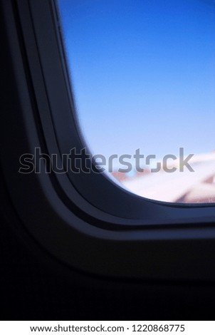 the scene of looking at the window in an airplane