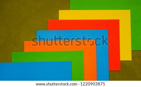 photo, image of colorful - orange, yellow , blue, red, green paper abstract  background. 