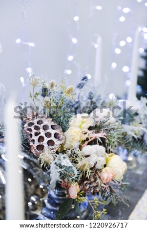 Christmas decor for table setting, or wedding decor, studio with a Christmas tree. Christmas decorations toys, candles, fir branches