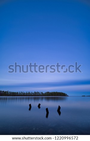 Calm evening in blue hour in northern Sweden archipelago.