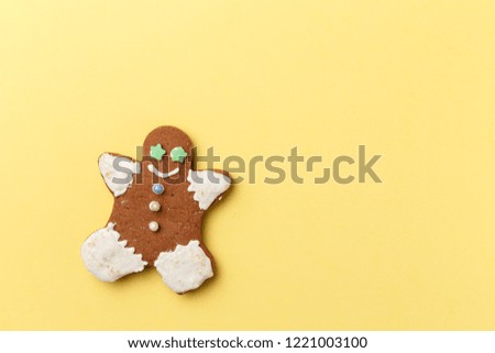 Christmas cookies on yellow background with copy space. Top view. Flat lay. Trendy colorful photo. Minimal style with colorful paper backdrop. Christmas concept