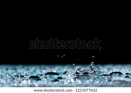 water drops on the surface background rain splashing water crown