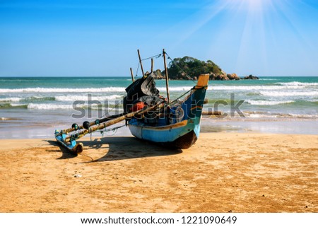 The traditional Sri Lanka's boat for fishing on the beach of indian ocean