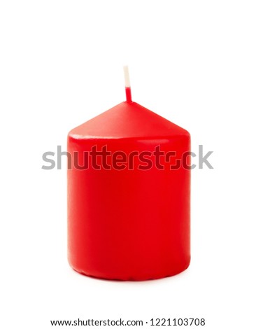 New red christmas candle isolated on white background