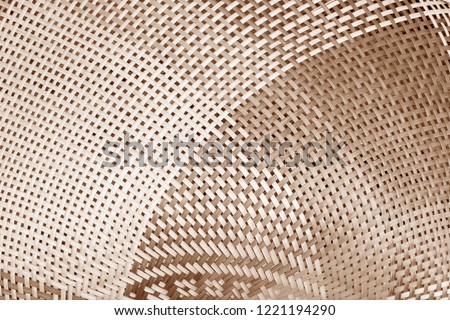 handmade brown bamboo or wicker weave texture background Royalty-Free Stock Photo #1221194290