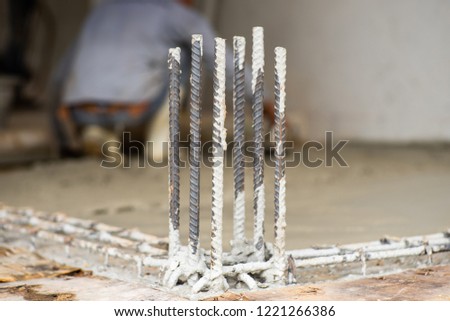 Selective focus picture of steel lines for reinforcement concrete structure at the construction site. Labor day