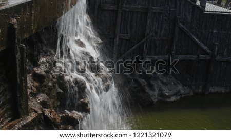 photo of the Jogja Bay fountain with a low shutter speed