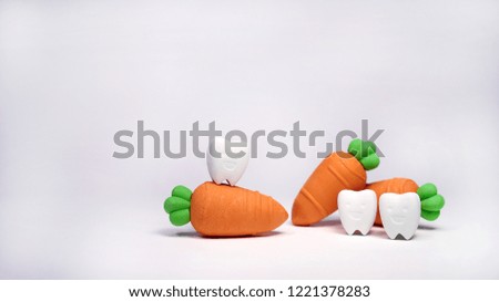 Smile Tooth Model with Carrot Model If You Eat Vegetables That Are Good For Your Teeth