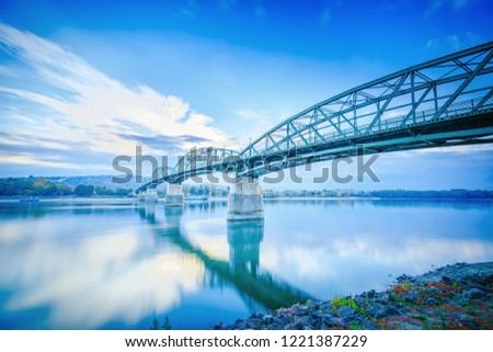 Bridge over Danube river between the Hungary and Slovakia, European Union countries. On the left side bank of Danube is Esztergom city - the first capital of Hungary, Europe. Breaking borders concept.