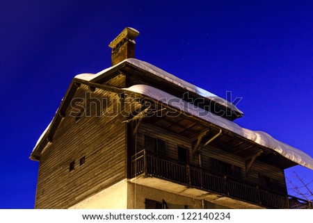 Illuminated House in the Village of Megeve, French Alps, France