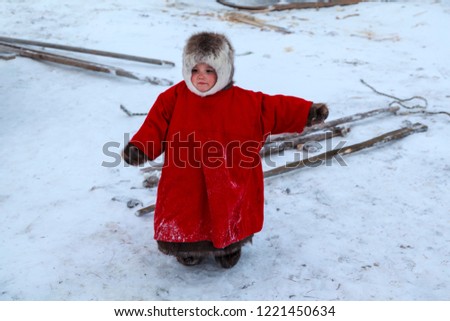 A resident of the tundra, indigenous residents of the Far North,  open area, Little girl in red clothes,Nenets-Malitsa clothing