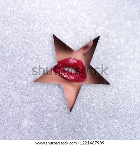 Beauty salon advertising banner with copy space. View of bright lips with glitter through hole in silver paper background. Make up artist, beauty concept. Square crop. Cosmetics sale