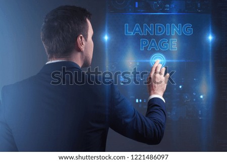Business, Technology, Internet and network concept. Young businessman working on a virtual screen of the future and sees the inscription: Landing page