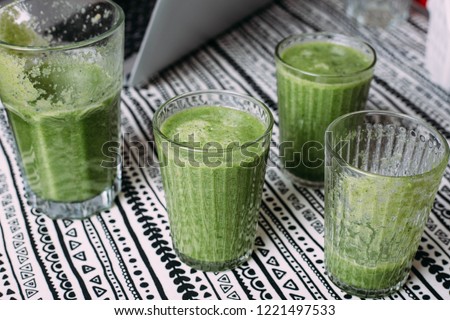 Fresh green smoothie on the table. Detox concept