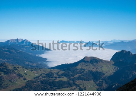 View from brienzer rothorn with foggy landscape panorama and blue sky