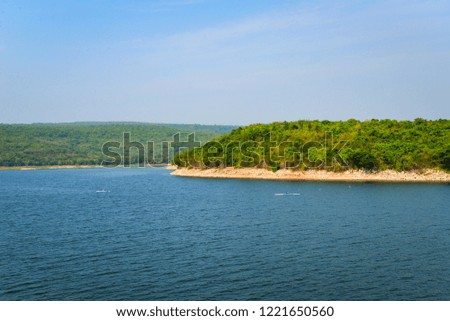 Green island view sea mountain background / Lagoon blue water 