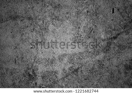 Old plastic background. The texture of old plastic. Weathered piece of plastic. Image includes a effect the black and white tones.