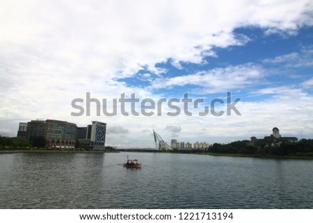 Beautiful Putrajaya view with bridge, boat and building 