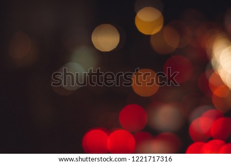 Bokeh night light on the avenue Light night at city blue bokeh sky festival abstract background blur lens flare reflection beautiful circle street with dark