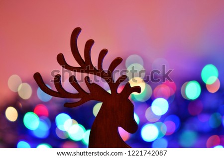 Christmas background with deer silhouette.