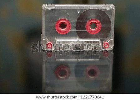 Old audio cassette on a black background, audio recording, film