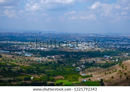 Cityscape from top of hill mountain, city surrounded by mountains, Pune, Maharashtra, western ghat