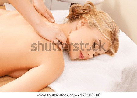 picture of calm beautiful woman in massage salon