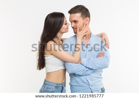 Relations, romance and people concept - Loving couple looking to each other