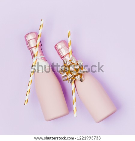 Mini bottles of champagne. Valentines day or birthday party concept theme. Flat lay, top view