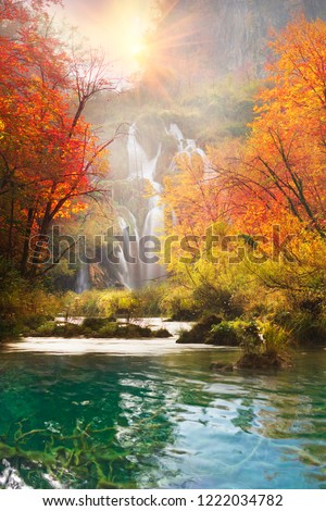 Plitvice Waterfalls in Croatia is one of the famous famous places in Europe, very beautiful. The jets of water on the background of autumn forests at sunrise are very picturesque