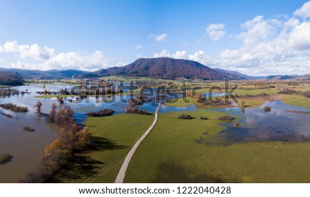 Planinsko polje is a most typical karst polje in Dinaric karst, Slovenia. After the heavy rain, the area is flooded and it becomes intermittent lake. Royalty-Free Stock Photo #1222040428