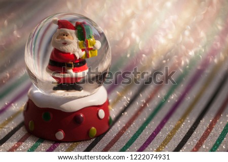 Snow globe with shiny background