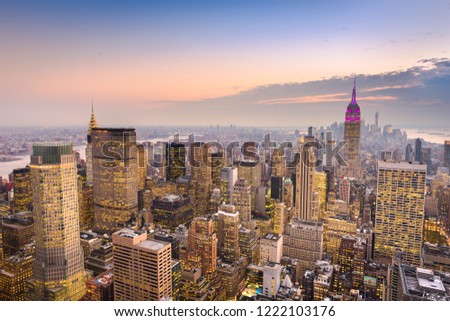  New York, USA downtown skyline over manhattan at dusk.