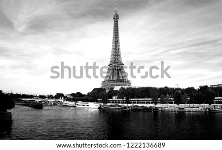 The Eiffel Tower is a wrought iron lattice tower on the Champ de Mars in Paris, France.