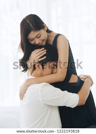 Portrait of Asian couple lover at home.