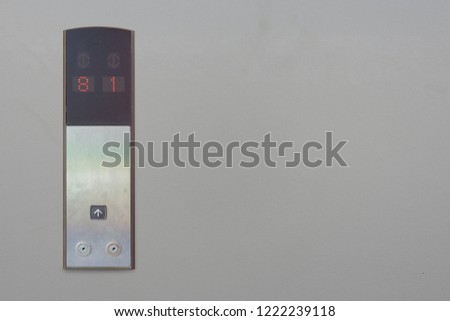 elevator switch panel, usage, office, on grey background,copy space