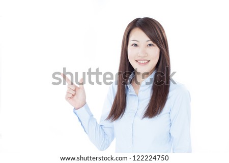 young business woman pointing copy space