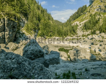 Landscape picture of hills with lake in Triglav national park in Slovenia.
