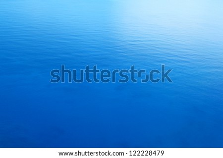 Still blue sea water surface as background