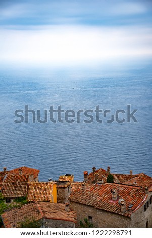 Red roofs and the sea view