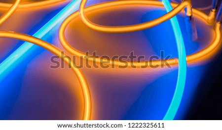 Blue and orange colors neon tube light abstraction